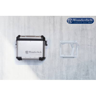 Držial alu kufrov na stenu sada