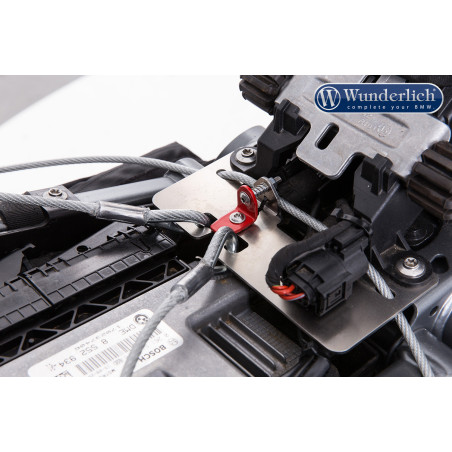 Držiak bezpečného upevnenia prilby